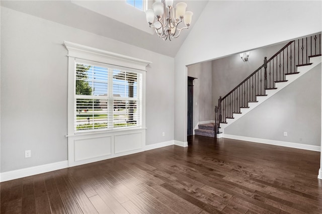3915 Baltic St, Springdale, AR 72762 - entrance foyer with stairway, hardwood / wood-style floors, a chandelier, and high vaulted ceiling