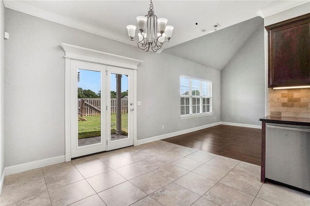 3915 Baltic St, Springdale, AR 72762 - unfurnished dining area featuring light tile patterned floors, a chandelier, and lofted ceiling