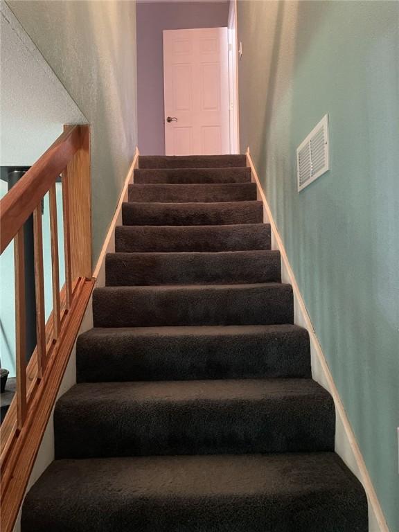 80 County Road 2560, Eureka Springs, AR 72631 - stairs featuring carpet