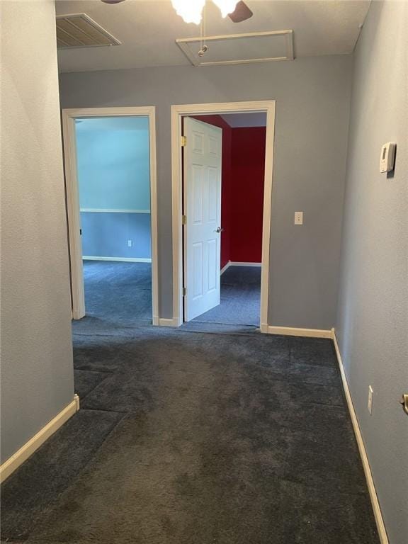 80 County Road 2560, Eureka Springs, AR 72631 - empty room featuring dark carpet and attic access