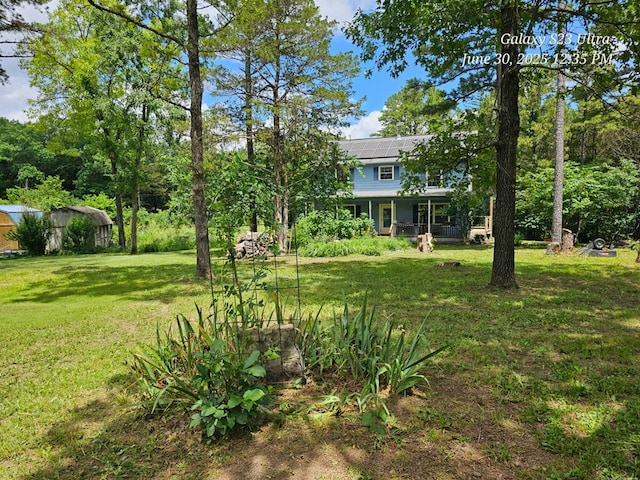 80 County Road 2560, Eureka Springs, AR 72631 - view of green lawn with a porch