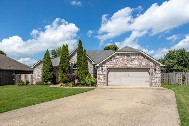 3000 SW Silverbark Rd, Bentonville, AR 72713 - view of front facade with brick siding, driveway, an attached garage, and a shingled roof