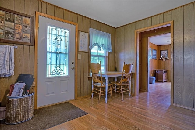 10746 Sr 27, Hector, AR 72843 - foyer featuring healthy amount of natural light, wood walls, and wood finished floors
