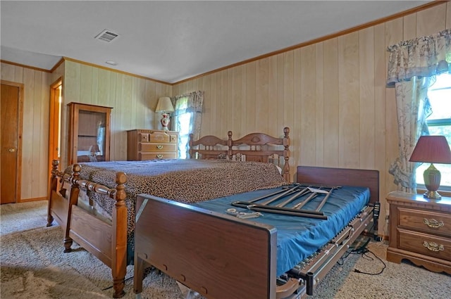 10746 Sr 27, Hector, AR 72843 - bedroom featuring ornamental molding, wooden walls, and carpet floors