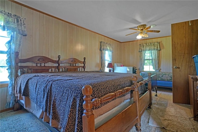10746 Sr 27, Hector, AR 72843 - bedroom featuring crown molding, wooden walls, and a ceiling fan