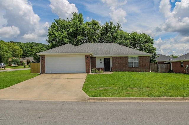 1142 S Jasmine Ln, Fayetteville, AR 72704 - single story home with an attached garage, concrete driveway, and brick siding