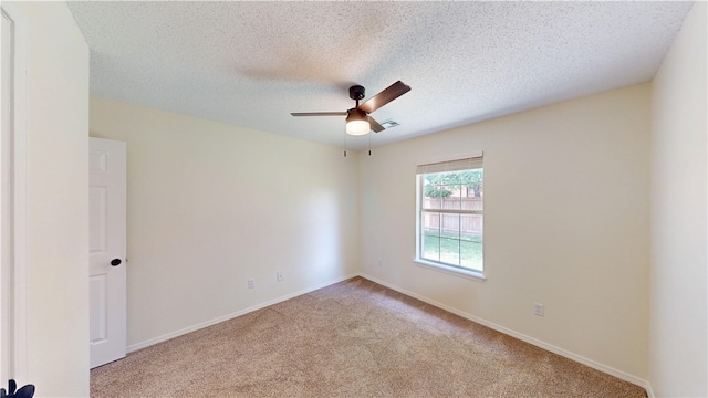 1142 S Jasmine Ln, Fayetteville, AR 72704 - carpeted spare room with a ceiling fan and a textured ceiling