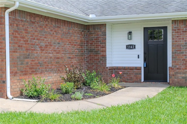 1142 S Jasmine Ln, Fayetteville, AR 72704 - entrance to property with brick siding and roof with shingles