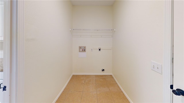 1142 S Jasmine Ln, Fayetteville, AR 72704 - laundry area featuring electric dryer hookup, washer hookup, and light tile patterned flooring