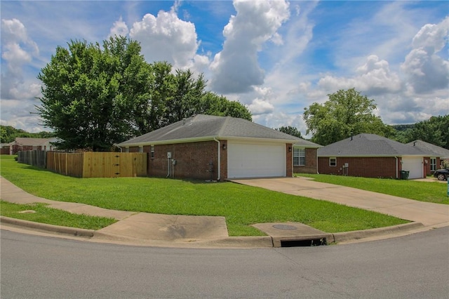 1142 S Jasmine Ln, Fayetteville, AR 72704 - view of front of house with driveway, brick siding, and a garage