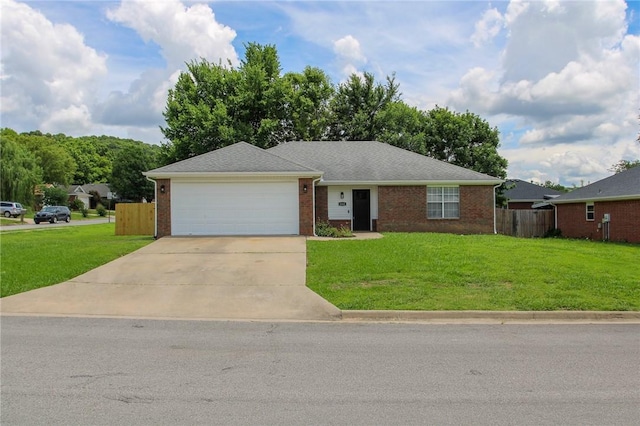 1142 S Jasmine Ln, Fayetteville, AR 72704 - single story home with concrete driveway, a garage, and brick siding