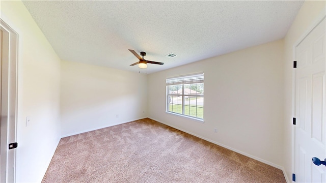 1142 S Jasmine Ln, Fayetteville, AR 72704 - unfurnished bedroom featuring carpet, ceiling fan, and a textured ceiling