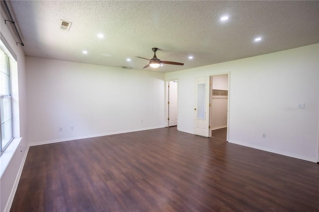 2472 W Jane Circle Dr, Fayetteville, AR 72704 - empty room with recessed lighting, a textured ceiling, a ceiling fan, and dark wood finished floors