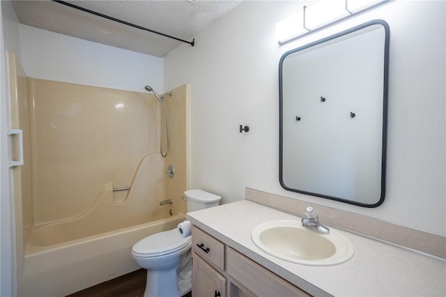 2472 W Jane Circle Dr, Fayetteville, AR 72704 - bathroom featuring shower / bathtub combination, vanity, a textured ceiling, and wood finished floors