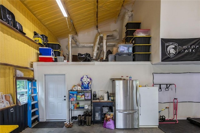 19475 Cotton Ln, Garfield, AR 72732 - garage with freestanding refrigerator and wood ceiling
