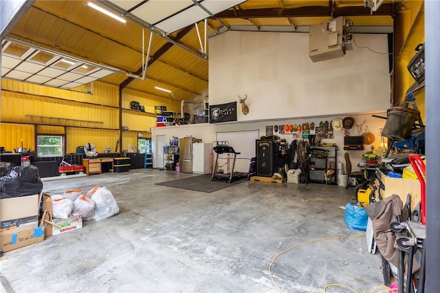 19475 Cotton Ln, Garfield, AR 72732 - garage featuring a workshop area