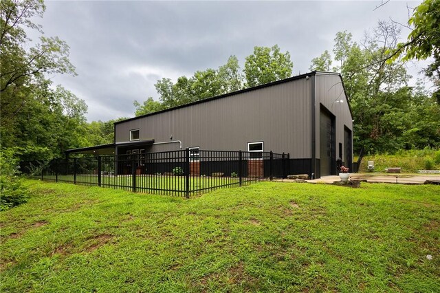 19475 Cotton Ln, Garfield, AR 72732 - view of property exterior with an outdoor structure and a pole building