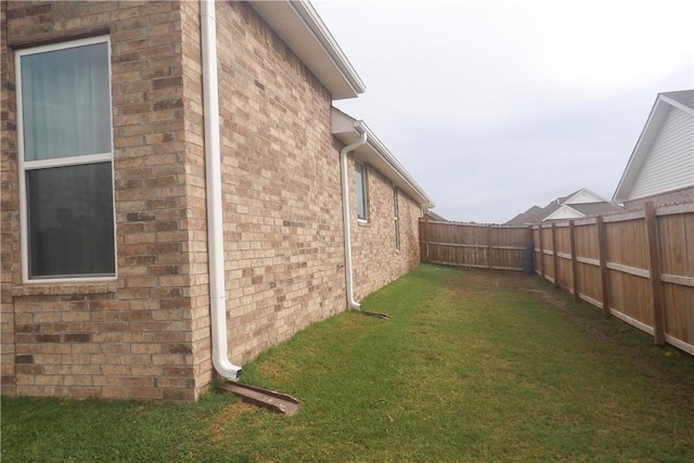 5399 Clear Springs Ave, Springdale, AR 72762 - view of side of home with a fenced backyard and brick siding