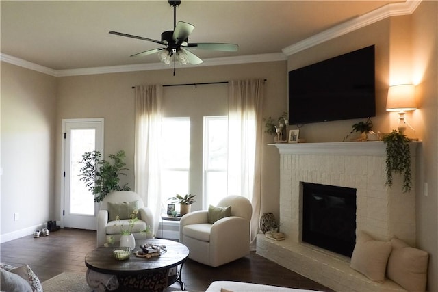 5399 Clear Springs Ave, Springdale, AR 72762 - living room with wood finished floors, a fireplace, a ceiling fan, and crown molding