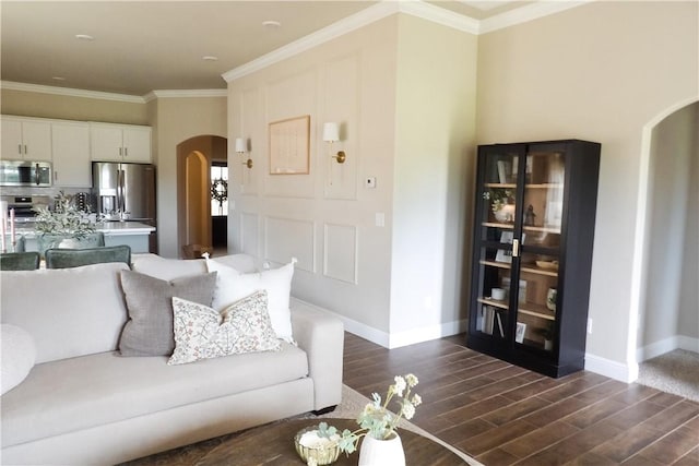 5399 Clear Springs Ave, Springdale, AR 72762 - living room featuring arched walkways, dark wood finished floors, and crown molding
