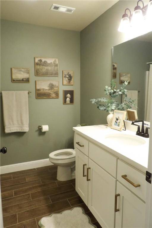 5399 Clear Springs Ave, Springdale, AR 72762 - bathroom with vanity and wood tiled floors
