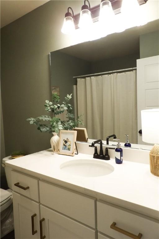5399 Clear Springs Ave, Springdale, AR 72762 - full bathroom with vanity and toilet