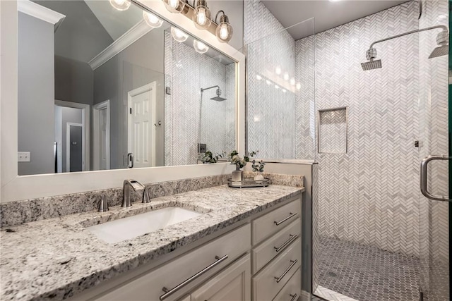 5503 S Turnberry Rd, Rogers, AR 72758 - bathroom with vanity, a shower stall, and ornamental molding