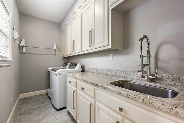5503 S Turnberry Rd, Rogers, AR 72758 - washroom featuring independent washer and dryer and cabinet space