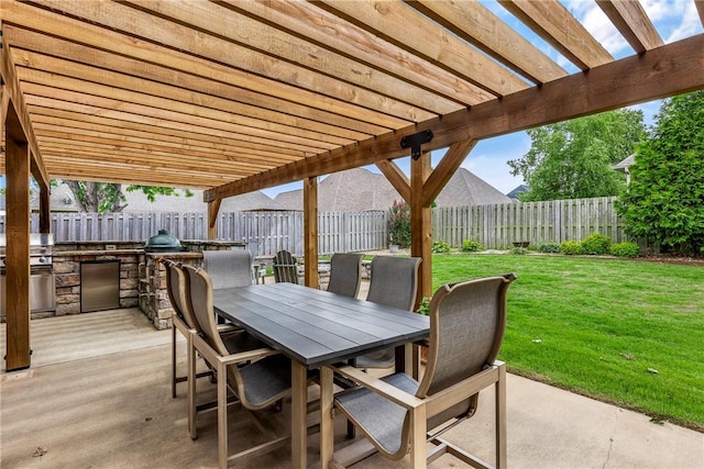 5503 S Turnberry Rd, Rogers, AR 72758 - fenced backyard featuring exterior kitchen, a pergola, outdoor dining space, and a patio area