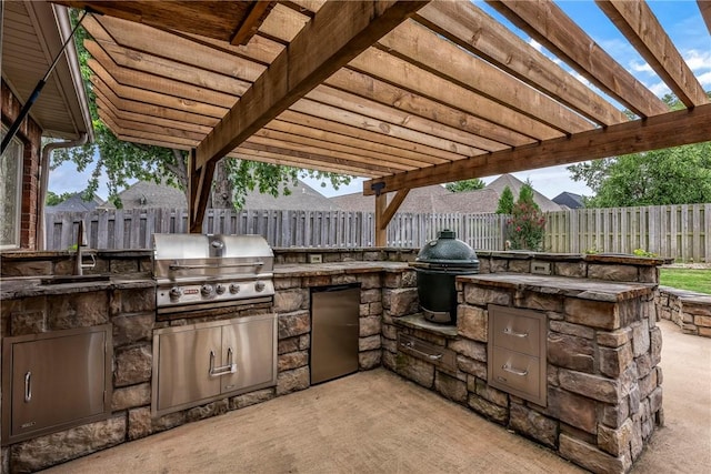 5503 S Turnberry Rd, Rogers, AR 72758 - fenced backyard with area for grilling, a pergola, and a patio area