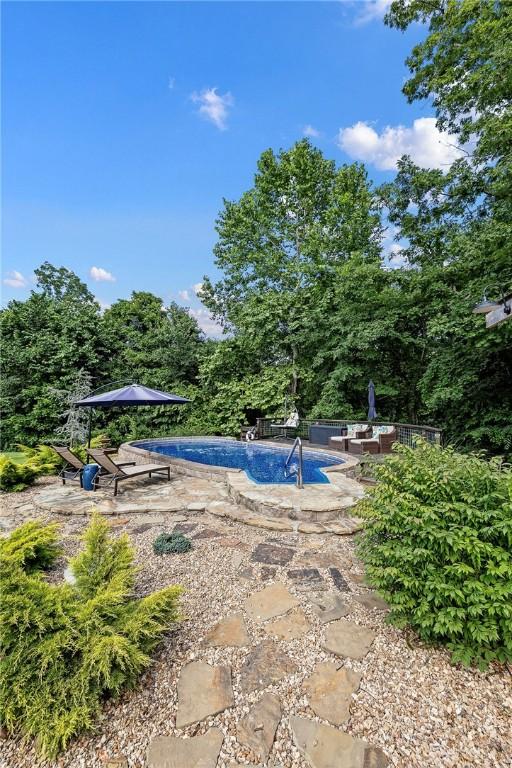 6 Leawood Pl, Bella Vista, AR 72715 - outdoor pool featuring a patio