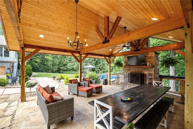 6 Leawood Pl, Bella Vista, AR 72715 - view of patio / terrace featuring an outdoor living space with a fireplace, a gazebo, ceiling fan, and outdoor dining area