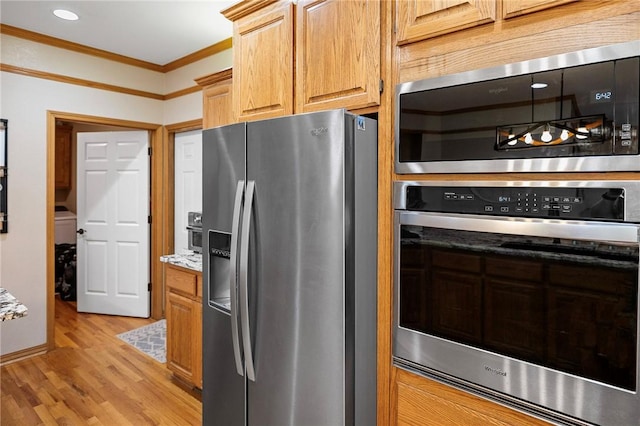 6 Leawood Pl, Bella Vista, AR 72715 - kitchen featuring appliances with stainless steel finishes, crown molding, light wood-type flooring, and recessed lighting