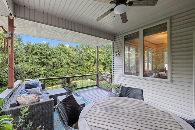 6 Leawood Pl, Bella Vista, AR 72715 - wooden terrace with a ceiling fan, outdoor dining space, and an outdoor hangout area
