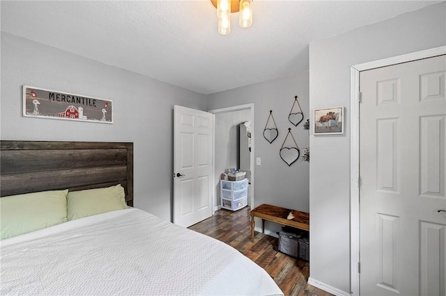 6 Leawood Pl, Bella Vista, AR 72715 - bedroom with dark wood finished floors and baseboards