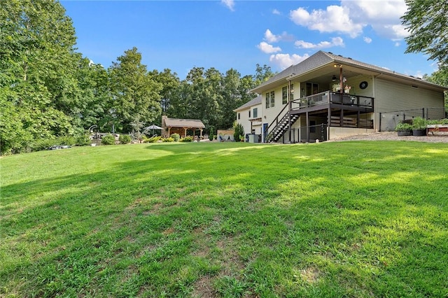 6 Leawood Pl, Bella Vista, AR 72715 - view of grassy yard with stairs and a wooden deck