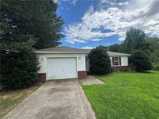 1811 Birchwood, Beebe, AR 72012 - ranch-style house featuring brick siding, concrete driveway, a front lawn, and a garage