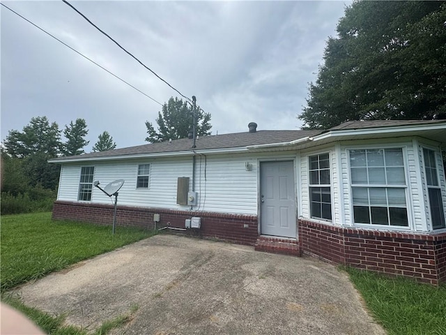 1811 Birchwood, Beebe, AR 72012 - view of front facade with a patio and brick siding