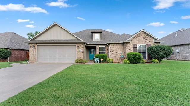 3809 N 2nd Pl, Rogers, AR 72756 - view of front of home with an attached garage, a front lawn, driveway, and brick siding