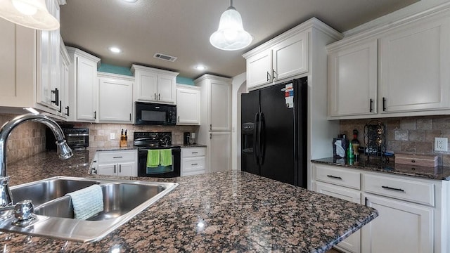 3809 N 2nd Pl, Rogers, AR 72756 - kitchen with black appliances, white cabinets, decorative backsplash, pendant lighting, and recessed lighting