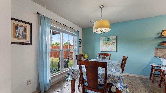 3809 N 2nd Pl, Rogers, AR 72756 - dining area featuring plenty of natural light and a chandelier
