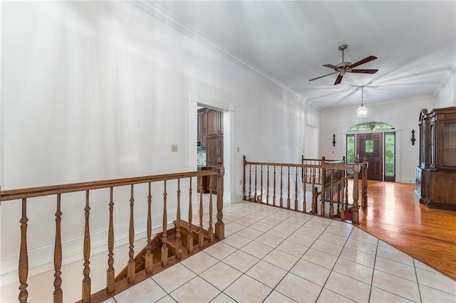 14074 Old Mill Rd, Elkins, AR 72727 - corridor with an upstairs landing, crown molding, and light tile patterned floors