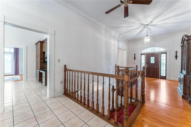 14074 Old Mill Rd, Elkins, AR 72727 - foyer entrance with ornamental molding, a ceiling fan, and light tile patterned floors