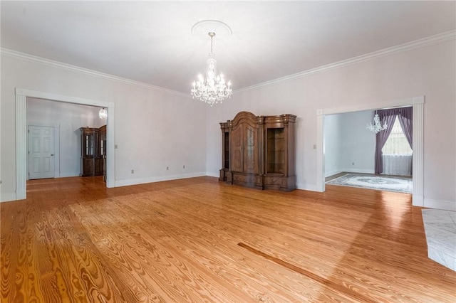 14074 Old Mill Rd, Elkins, AR 72727 - unfurnished living room featuring a chandelier, ornamental molding, and light wood-type flooring