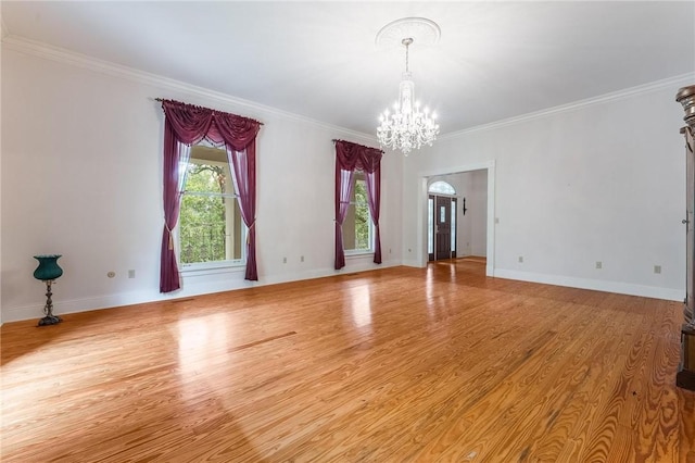 14074 Old Mill Rd, Elkins, AR 72727 - empty room featuring a chandelier, wood finished floors, and crown molding