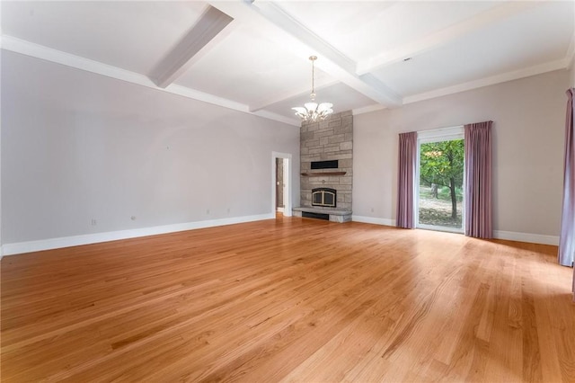 14074 Old Mill Rd, Elkins, AR 72727 - unfurnished living room with a chandelier, light wood-style floors, beamed ceiling, a fireplace, and ornamental molding