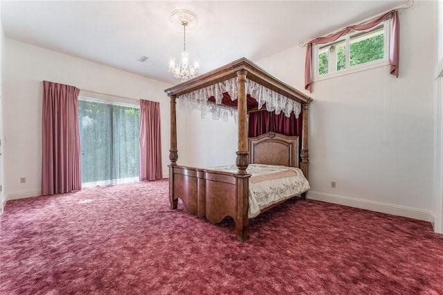 14074 Old Mill Rd, Elkins, AR 72727 - carpeted bedroom featuring a chandelier and baseboards