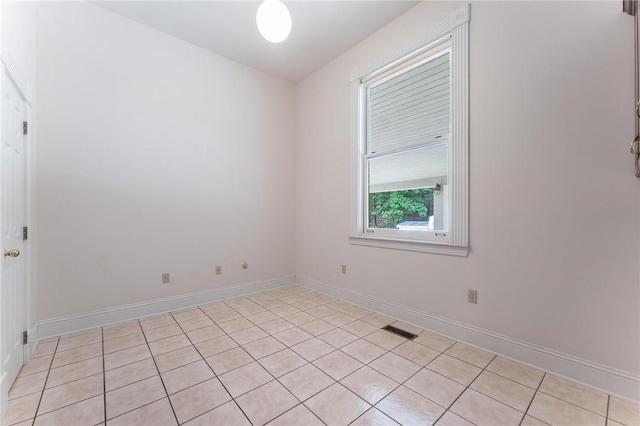 14074 Old Mill Rd, Elkins, AR 72727 - spare room with light tile patterned flooring and baseboards