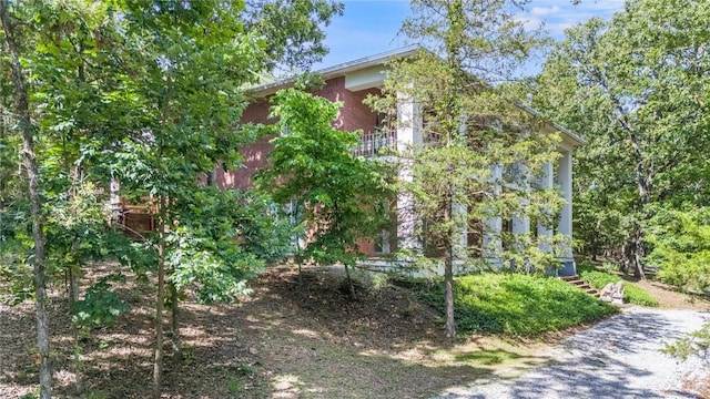 14074 Old Mill Rd, Elkins, AR 72727 - view of side of home with brick siding