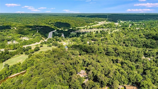 25 Grisham Cir, Bella Vista, AR 72715 - aerial view of property and surrounding area with a heavily wooded area